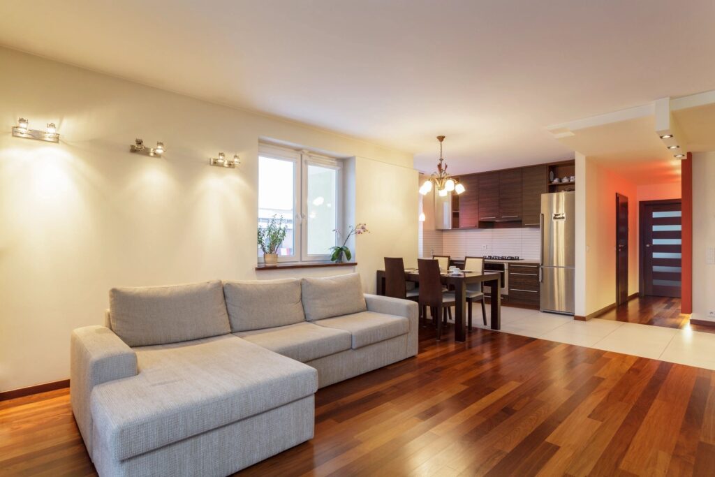 A living room with a couch and table in it
