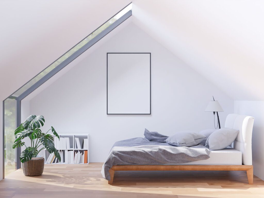 Minimal attic bedroom with bed and skylight